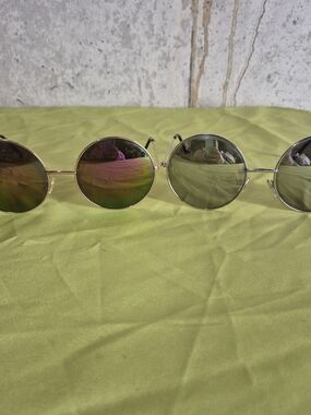 Aj Morgan Round Metal Sunglasses with Gold and silver Frames and metallic Lenses